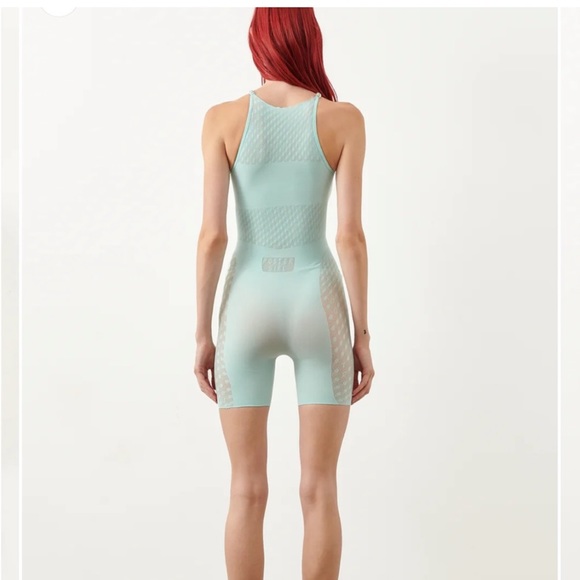 Poster Girl
Jetta Jumpsuit AND Sabinna sleeves in Soft Turquoise NEW - Picture 8 of 12